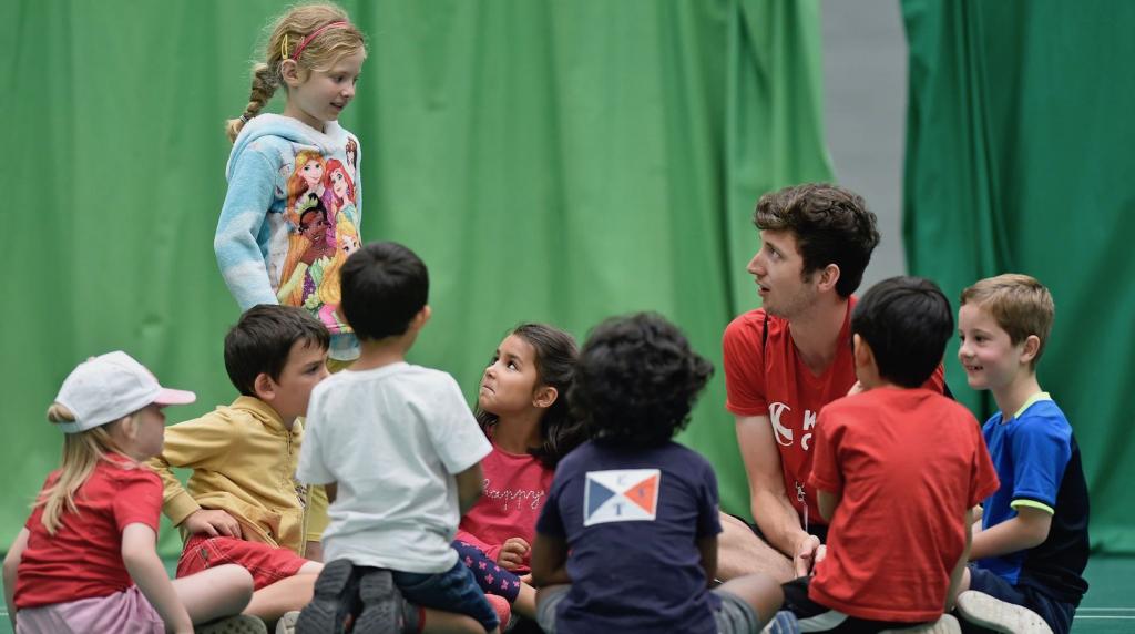 Small group sports hall young